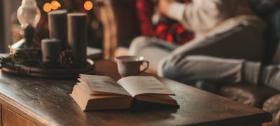 portrait-candid-authentic-smiling-boy-teenager-having-fun-emotion-wooden-lodge-xmas-decorated (1)
